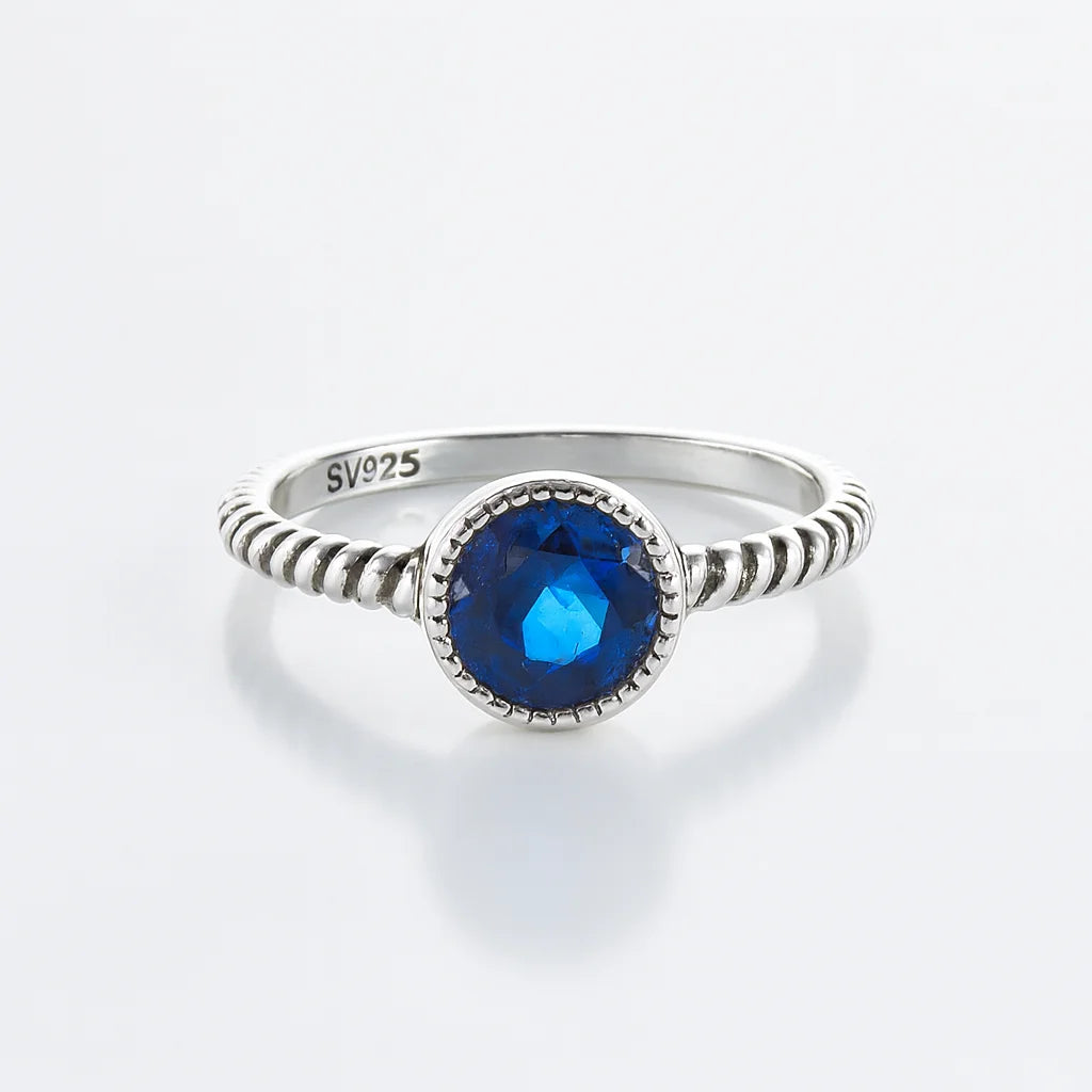 Ocean's Whisper — 925 Silver Rings with Sapphire Elegance