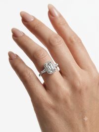 Diamond Rings Emerald Halo Design with Solitaire Centre