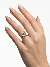 Wings of Grace: Sterling Silver Rings with Artful Diamond Flourish