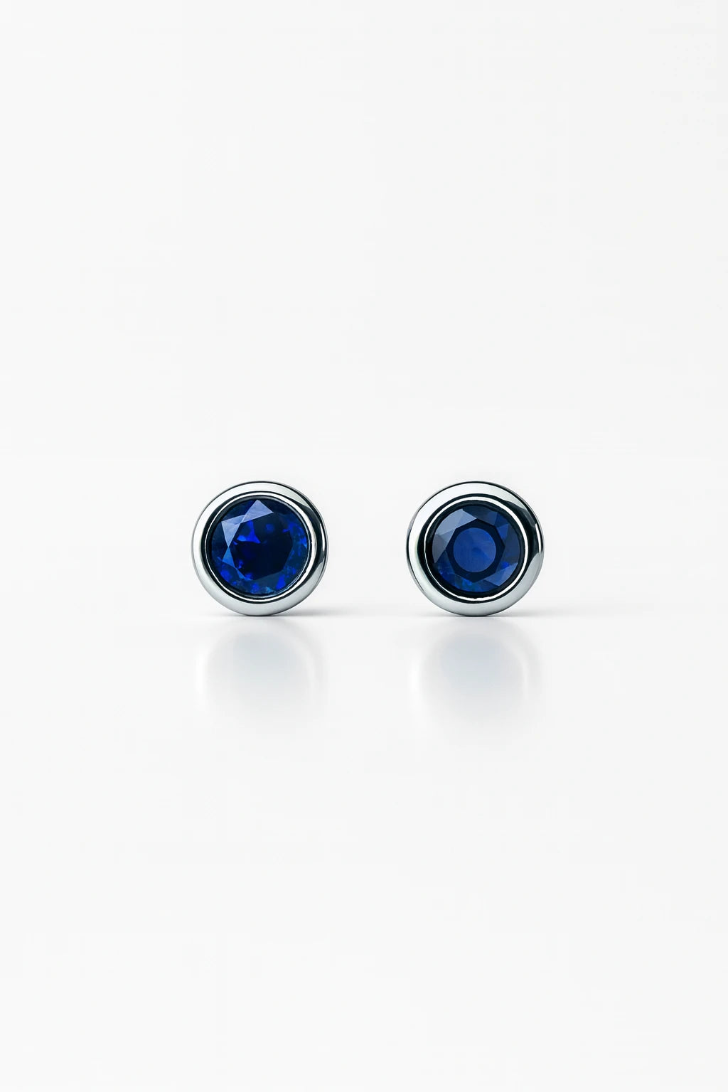 Emerald Radiance: Majestic Oxidised Silver Stud Earrings