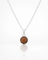 Natural Rudraksh in a Minimal Silver Luxe Shell