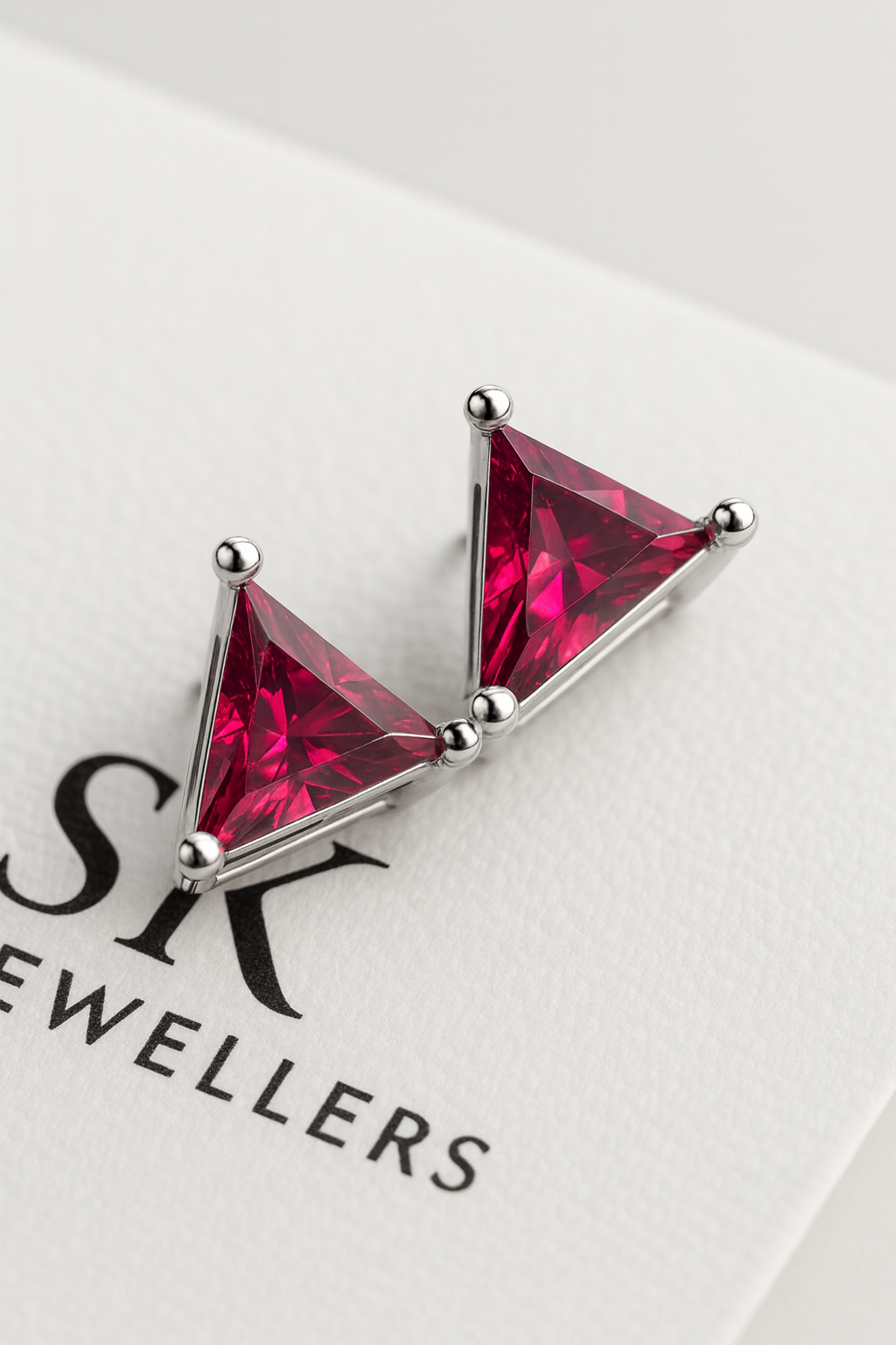 Divine Triangle: Ruby-Touched Oxidised Silver Stud Earrings