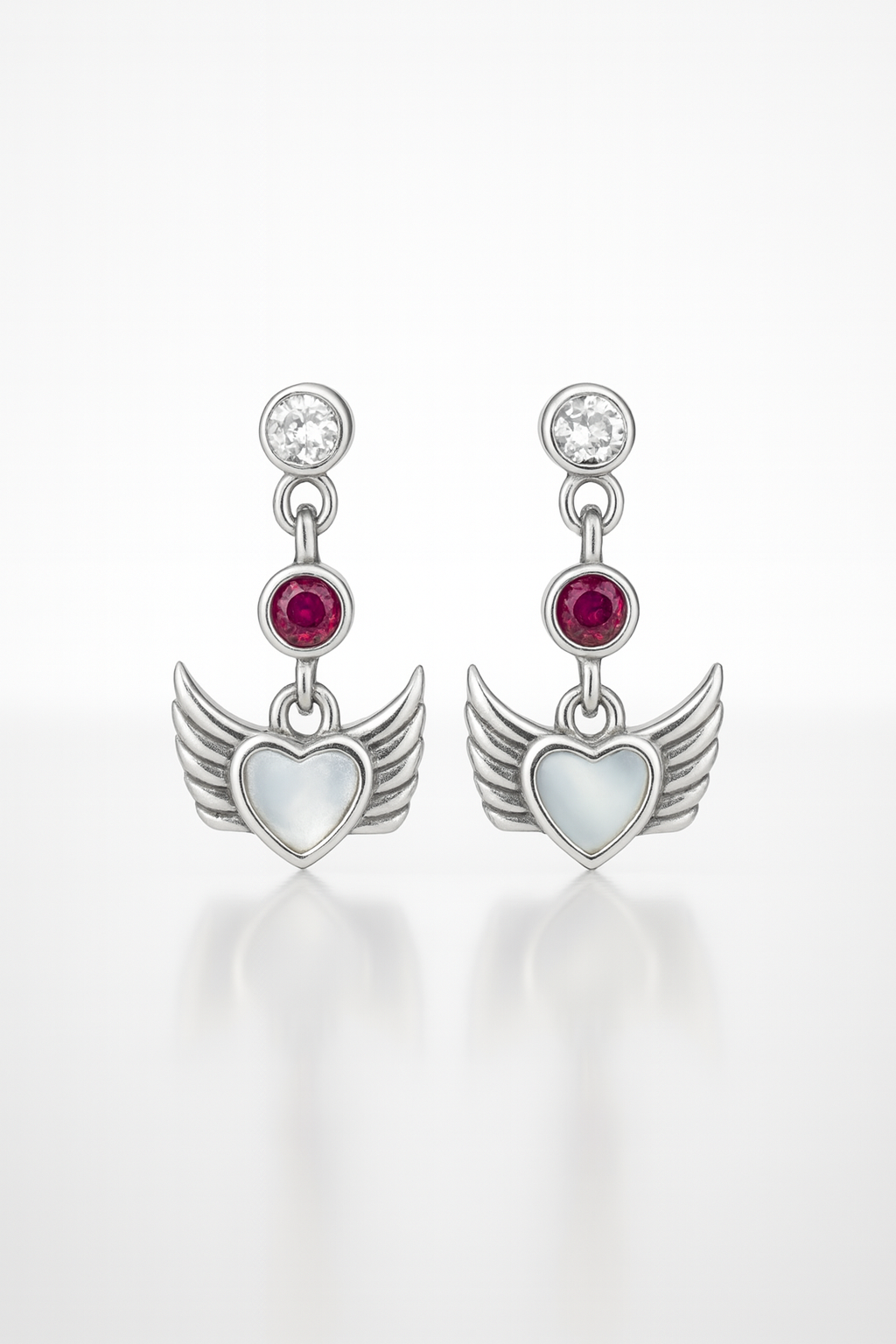 Wings of Serenity: Heartfelt Oxidised Silver Winged Earrings